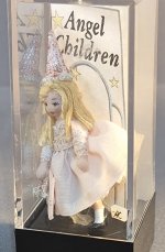Angel Children by Ethel Hicks, White dress with party hat